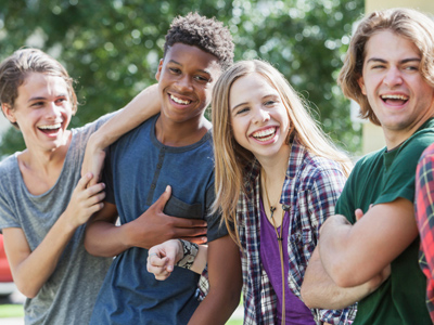 Group of young friends having fun and smiling