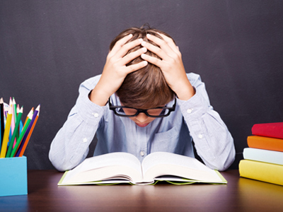 Boy struggling to understand his school work