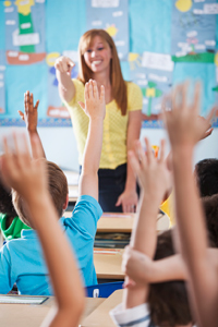 Happy female teacher in school