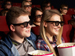 Friends laughing at film