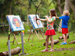 Children learning archery