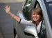 Girl waving goodbye